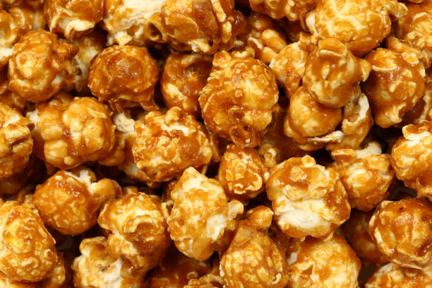 istock Caramel popcorn background or wallpaper 1404025121