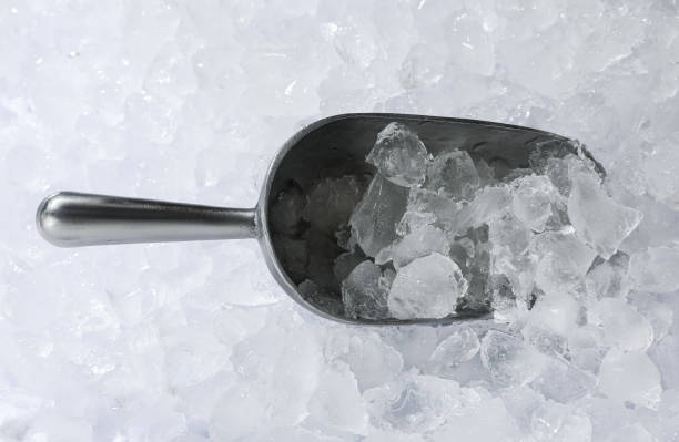 istock Metal scoop on crushed ice, top view 1404025701
