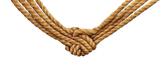 Colored ropes tied in a knot on a white background