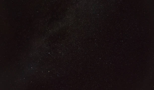 istock Night sky with in area near constellation Andromeda, five distinct stars forming Cassiopeia visible in lower left 1404026974