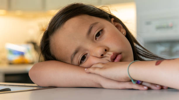 istock A Beautiful Young Girl with a Serious Face 1404027327