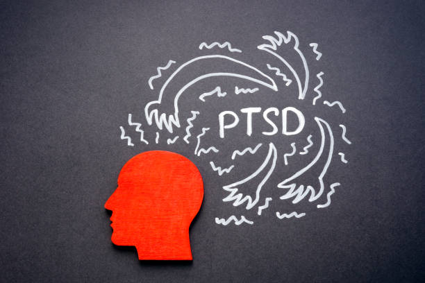 istock PTSD concept. Figurine of a head on a dark surface. 1404029818