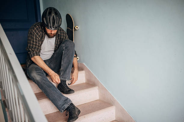 Skater putting on shoes