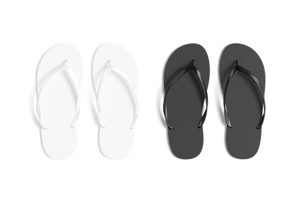 istock Blank black and white beach slippers mockup, top view 1404030254