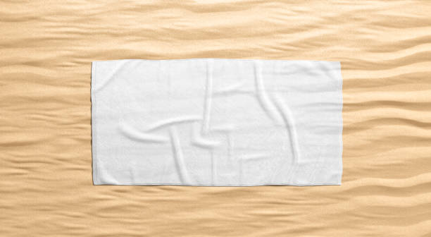 Blank white crumpled unfolded big towel mock up, sand background Blank white crumpled unfolded big towel mock up, sand background, 3d rendering. Empty textile wipe material on beach surface mockup, top view. Clear cotton dry bath sheet template. desert wash stock pictures, royalty-free photos & images