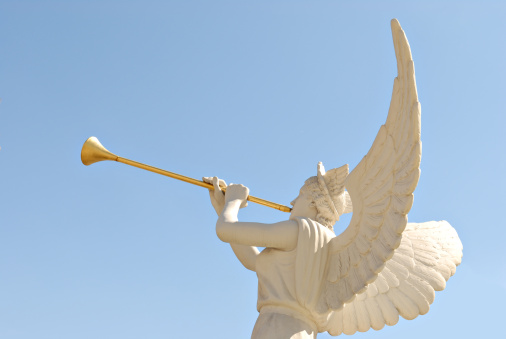 Angel with golden trumpet