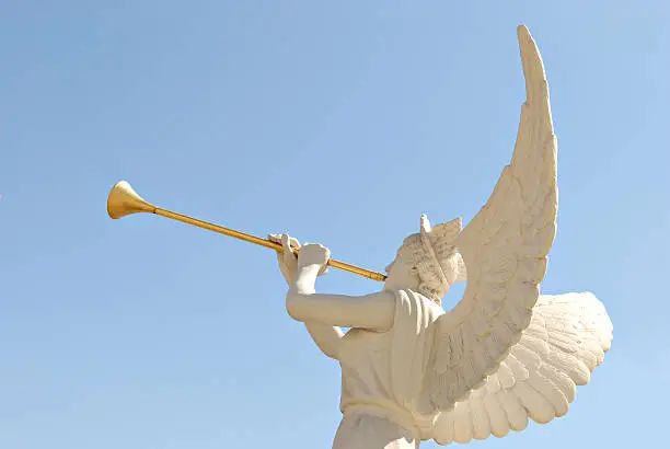 Angel with golden trumpet