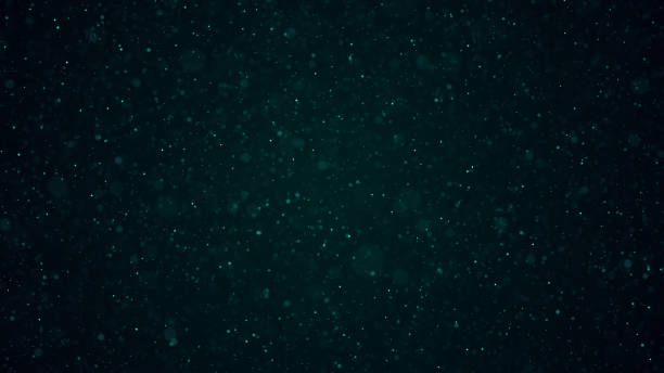istock Dust particles with bokeh effect on dark background. Abstract magic background. Starry sky. 3d rendering. 1404031413