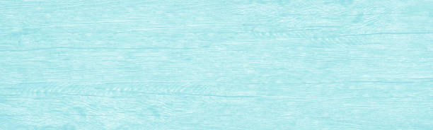istock Light turquoise shabby color wood grain wide texture. Abstract bright teal backdrop. Pastel aquamarine wood textured background 1404032754