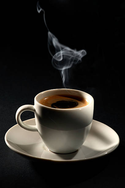 istock Cup of coffee on saucer with steam 140403396