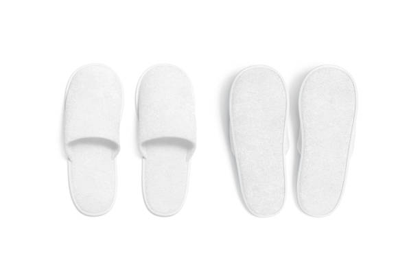 istock Blank white home slippers mockup, top view, front and back 1404034042