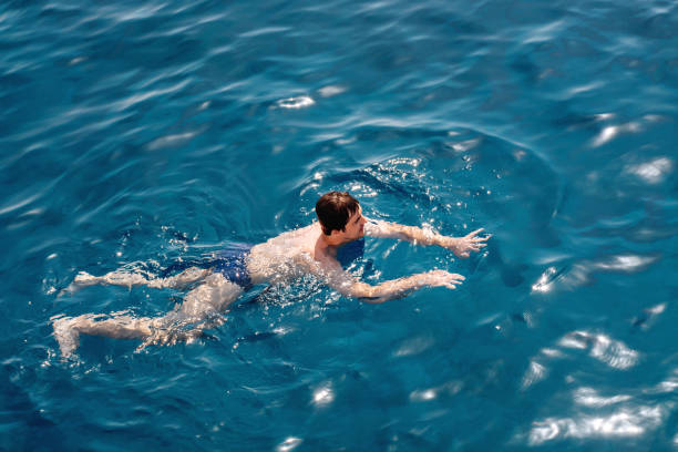 istock Man swims in the sea 1404035496