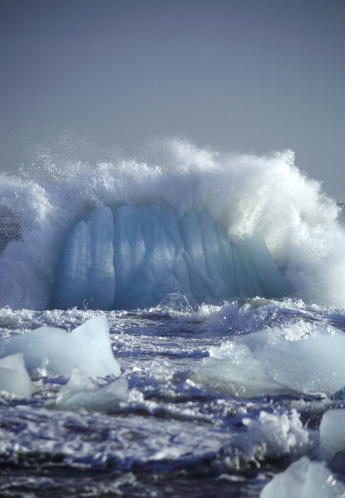 Iceberg being smashed up by the sea Iceland (350dpi)