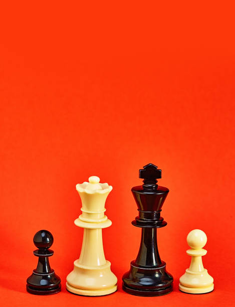 istock Chess king, queen and pawns represent a multiracial blended family 1404037710