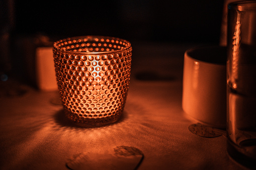 A little tealight in an orange glass