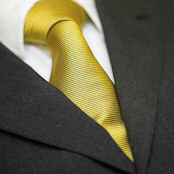 ビジネスドレス - necktie close up suit lapel ストックフォトと画像