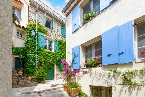 Traditional, charming streets in the medieval village of Grimaud, France, in the hills above Saint-Tropez along the French Riviera.