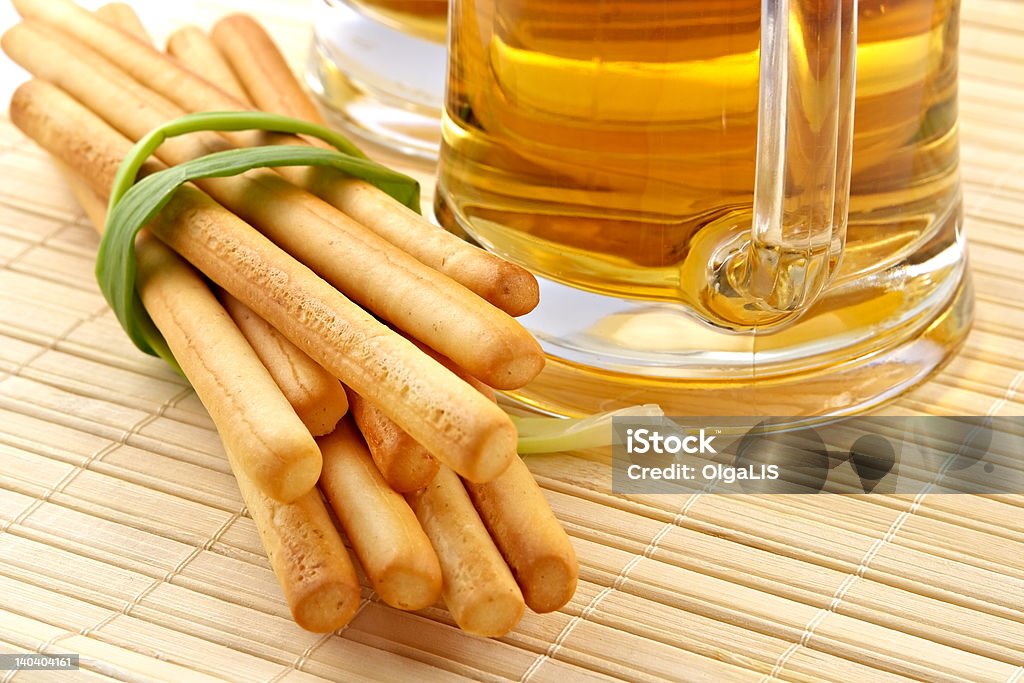 Beer and snack Beer and snack-grain grissini with cheese and an onions  Alcohol - Drink Stock Photo