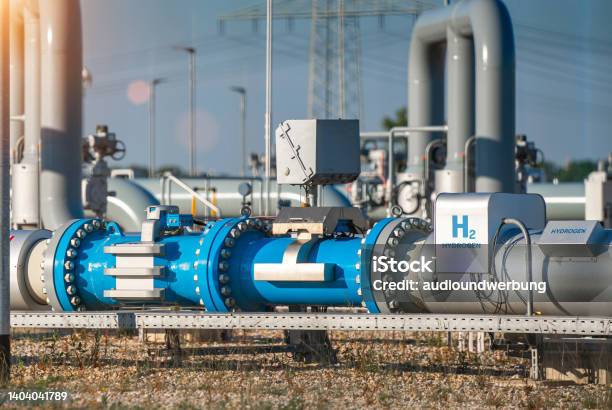Hydrogen Renewable Energy Production Pipeline Hydrogen Gas For Clean Electricity Solar And Windturbine Facility Stock Photo - Download Image Now