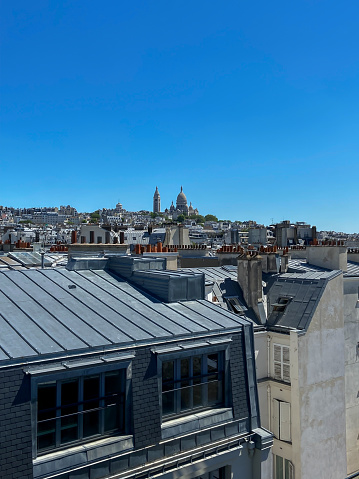 Paris, view of typical roofs of the French capital, ancient and modern buildings