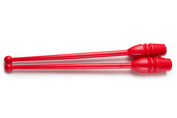istock two red clubs for gymnastics, lie side by side, on a white background 1404043073