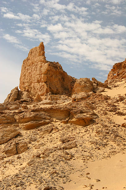 Peaking sandstone formation in Western Sahara of Egypt stock photo