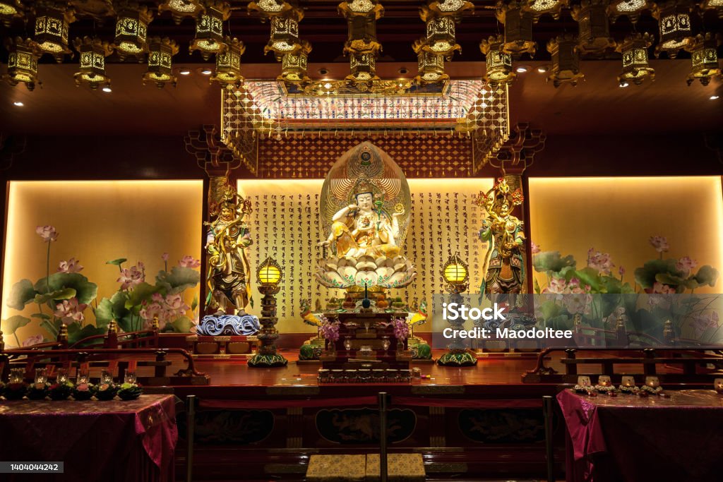 Buddha Statue in Buddha Tooth Relic Temple and Museum Buddha Statue in Buddha Tooth Relic Temple and Museum, It's a Tang-styled Chinese Buddhist temple and museum complex located in the Chinatown district of Singapore Ancient Stock Photo