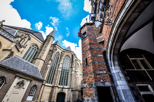 Low Angle View Of Tall Windows Perched On St. Stephen's Church Walls In Nijmegen, The Netherlands