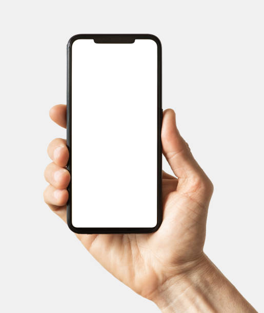 Male hand showing smartphone with white blank screen mock-up, isolated on grey background