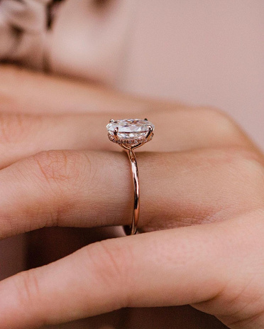 luxury diamond rings on woman fingers