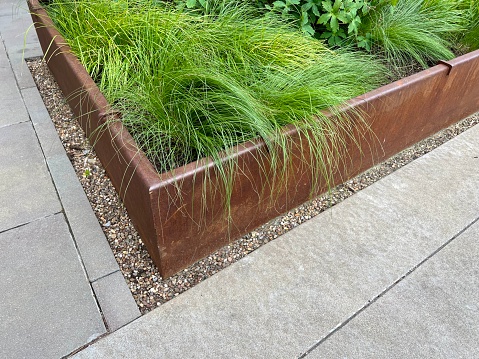 Weathering Corten steel planters in city