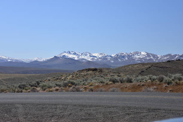 istock Across The Rural Road From The Mountains 1404052359