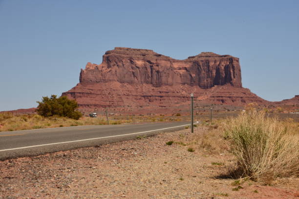 istock Roadside Plateau Against Clear Blue Sky 1404054589