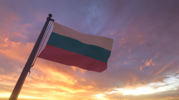 Bulgaria Flag on Flagpole by Evening Sunset Sky stock photo