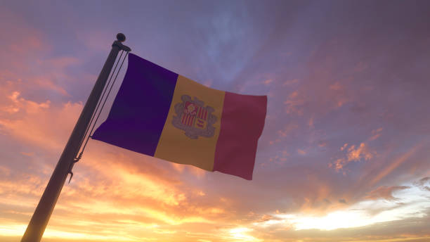 Andorra Flag on Flagpole by Evening Sunset Sky stock photo