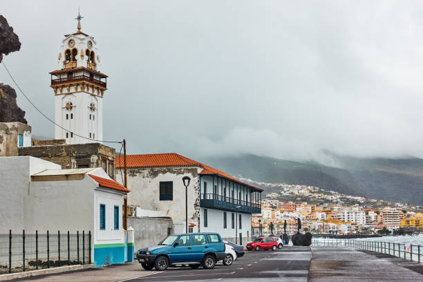 Candelaria, Tenerife, Spain - December 12, 2019: Old church an waterfront in Candelaria town