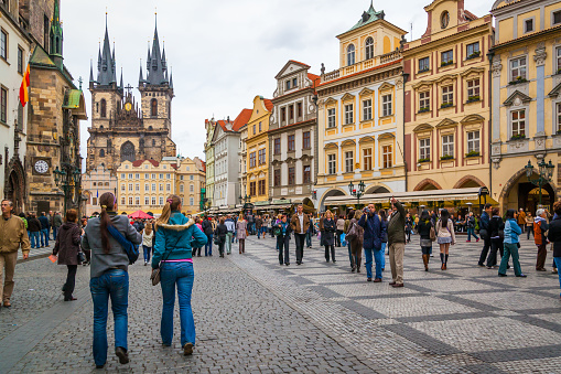 Prague, Czech Republic - October 10, 2009: Walking people in The Old Town Square in Prague. Cityscape