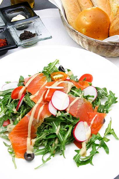 salmon rocket salad stock photo