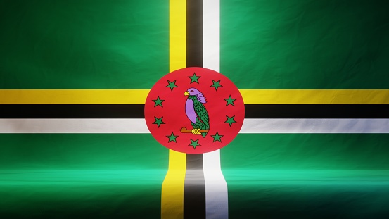 Studio backdrop with draped flag of Dominica for presentation or product display. 3D rendering