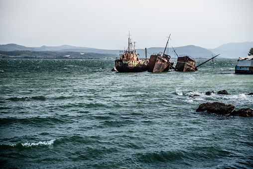 Human Industry Pollution - Old Abandoned Fishing Boats Close to Preveza Beach in Greece
