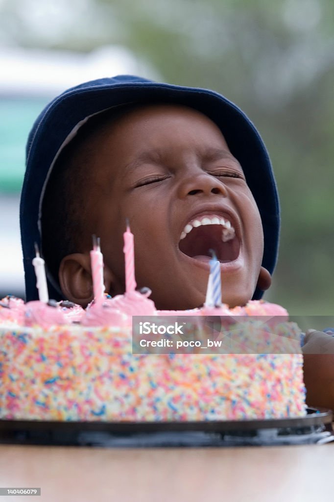 birthday boy birthday boy laughing, multicolor cake African-American Ethnicity Stock Photo