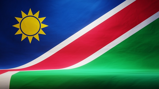Studio backdrop with draped flag of Namibia for presentation or product display. 3D rendering