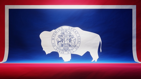 Studio backdrop with draped flag of the US state of Wyoming. 3D rendering