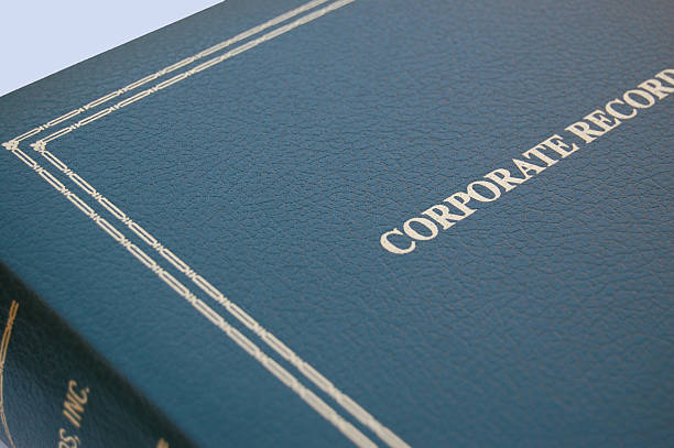 Green Corporate Book Corporate minute book in green. minute hand photos stock pictures, royalty-free photos & images