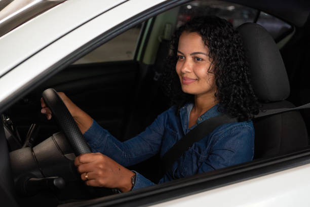 istock Woman driving car 1404063400