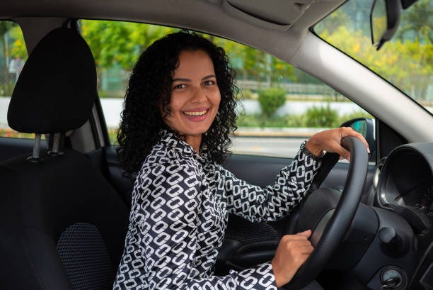 istock Woman driving car 1404063415