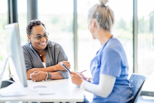 istock African Woman at a Medical Appointment 1404066949