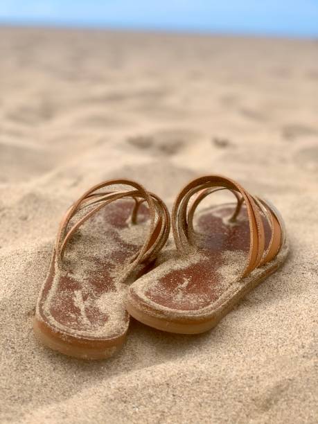 istock Sandals in the sand 1404067639