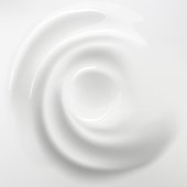 istock White cream background. Swirl blended mousse. Cosmetic or dairy product. Liquid spirals top view. Creamy whirlpool. Whipped vanilla dessert. Smooth vortex with twirls. Vector concept 1404069373