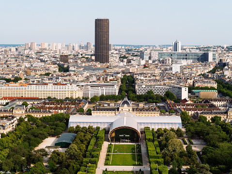 Southern Paris seen from the second floor of the Eiffel tower. Ecole militaire behind the Champ de Mars park, and the Montparnasse tower in the background. France